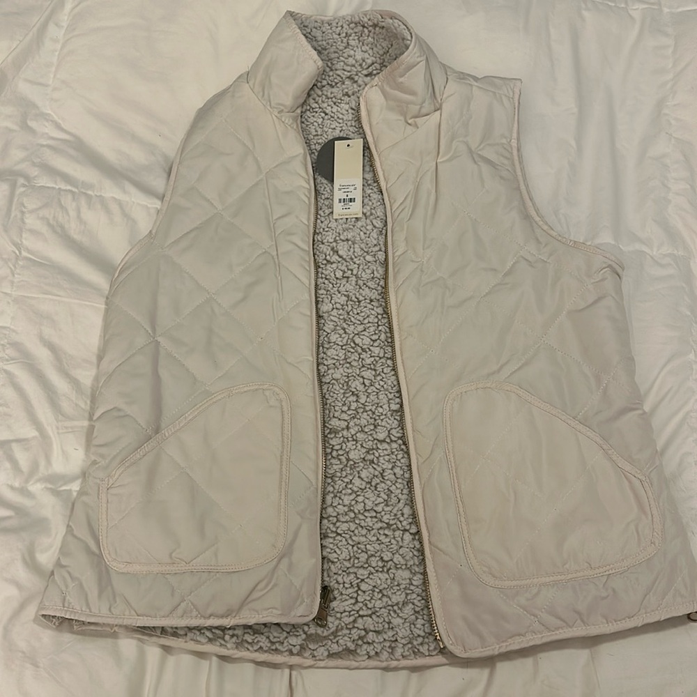 Brand new with tags cream Sherpa vest from Francesca’s